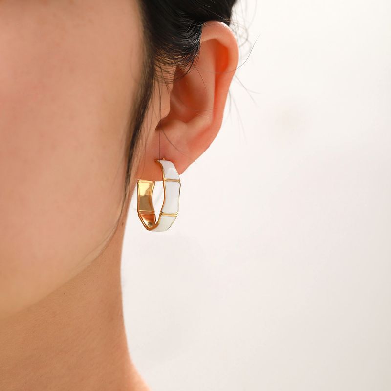 Orecchini a goccia a forma di C in acciaio inossidabile con sezione in bambù dorato, alla moda e di alta qualità, INS_voghion.com