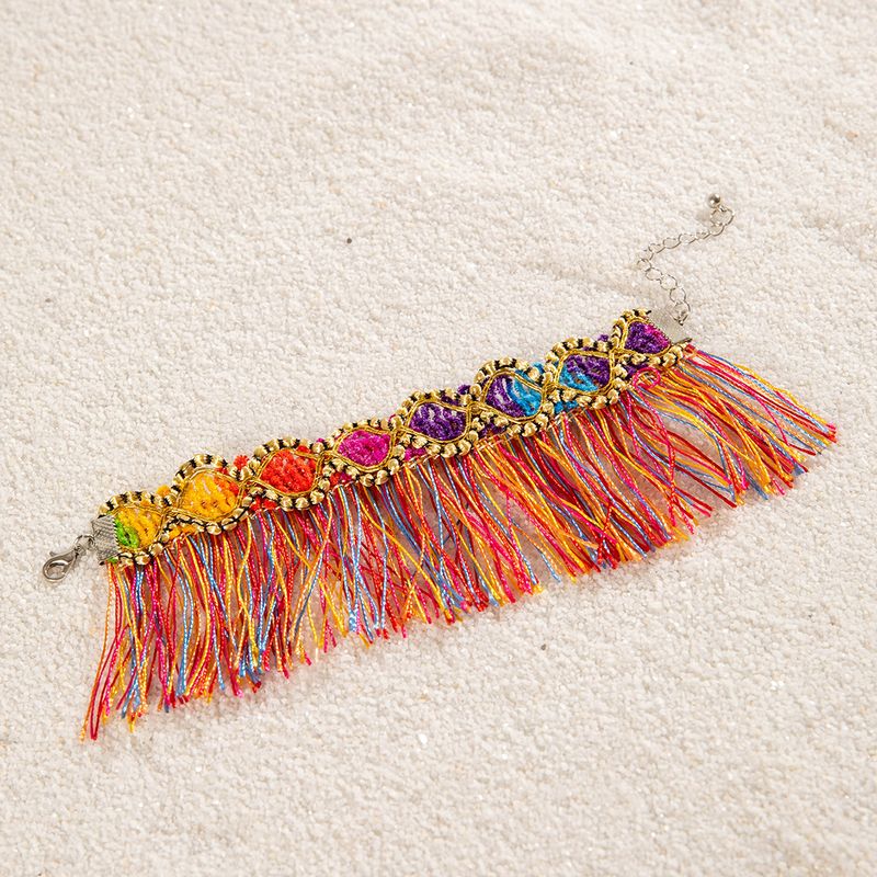 Braccialetto con nappe colorate in stile etnico in stile bohémien, gioielli in tessuto per donna_voghion.com