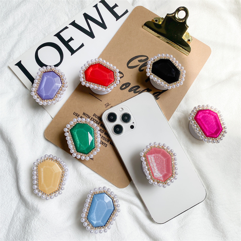 Creative mobile phone desktop stand with stretchable, foldable, portable, and stable pearl Korean Instagram air cushion_voghion.com