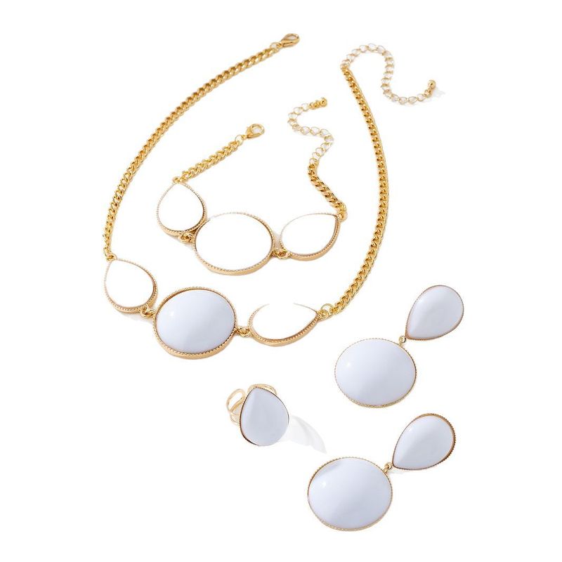Set di gioielli da donna con collana, orecchini, bracciale e anello intarsiati con gocce d'acqua geometriche eleganti e alla moda_voghion.com