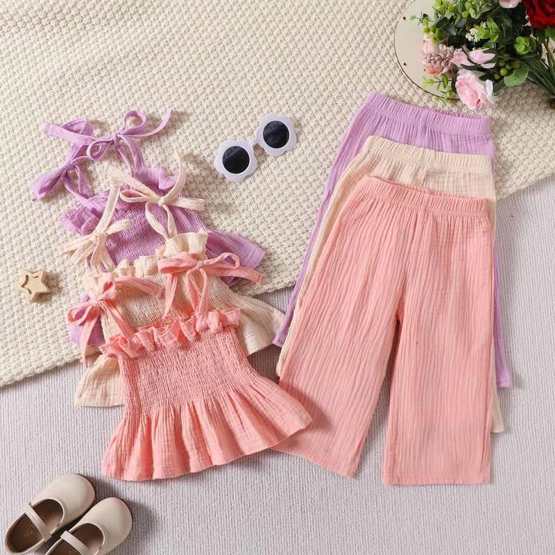 Mother&Kids Set estivo in due pezzi per neonati e ragazze con cinturino in pizzo e spalline in tinta unita, pantaloni a gamba dritta, pantaloni a vita bassa_voghion.com