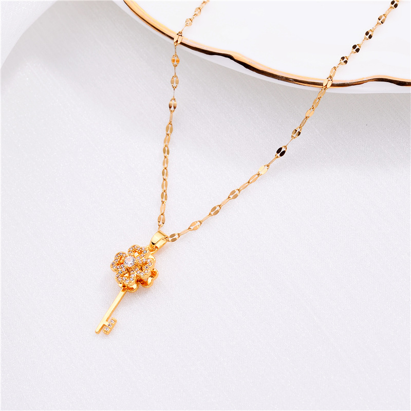 Tid for å løpe roterbar nøkkelhalskjede i titanstål for kvinner; falmfri mikroinnlagt zirkon motenett rødt kragebenkjede_voghion.com