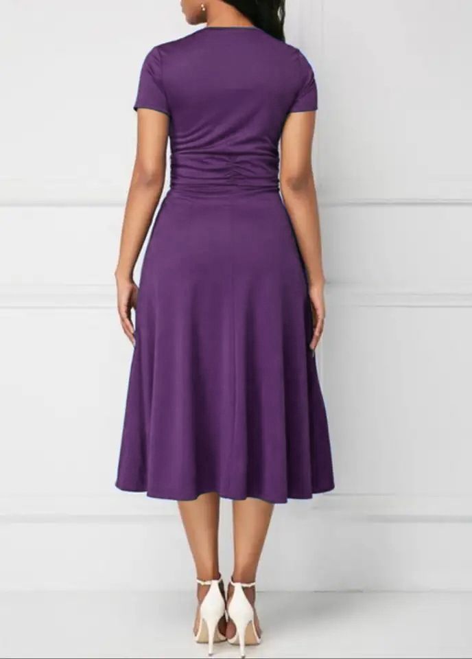 Abito con scollo a V e gonna ampia asimmetrica, temperamento moda 2025_voghion.com