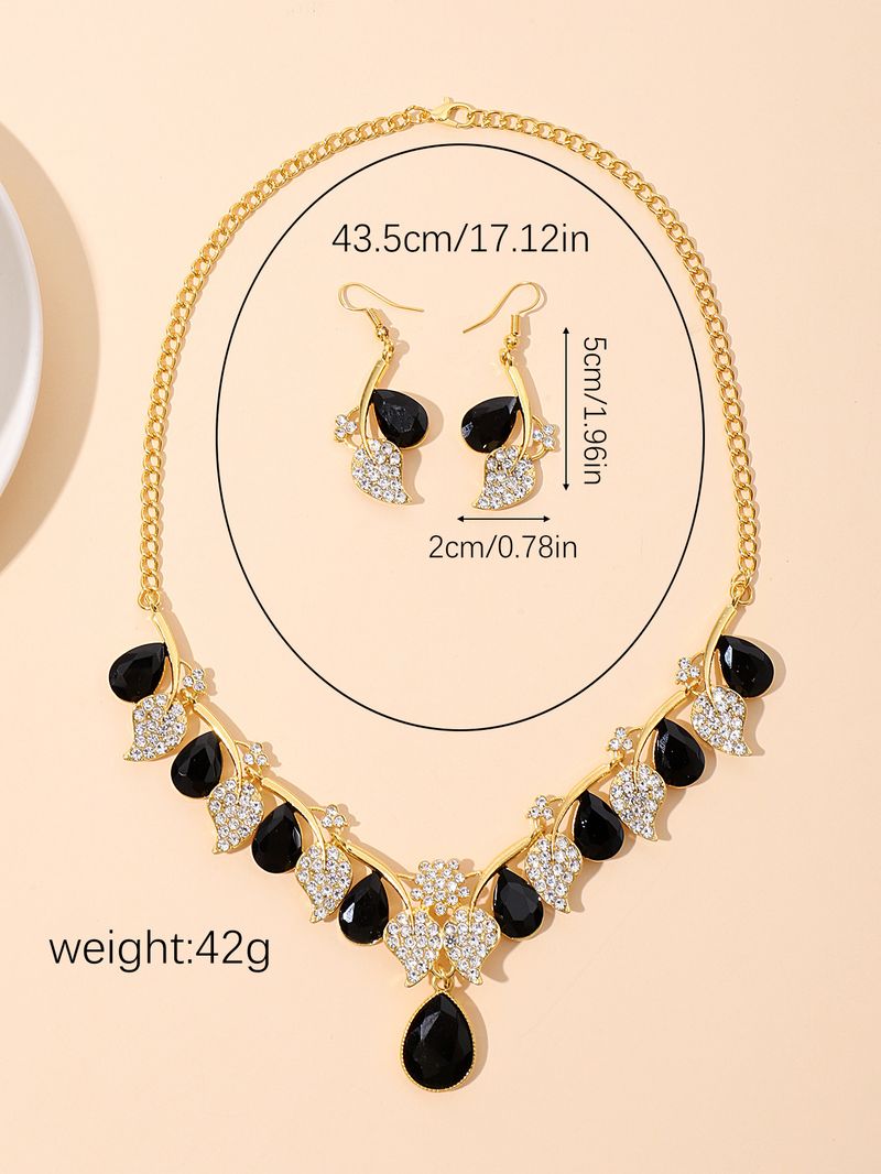 Set di gioielli da donna con collana di cristalli, pochette da sera, elegante design floreale per occasioni formali, versatile set di collana e orecchini di cristalli_voghion.com