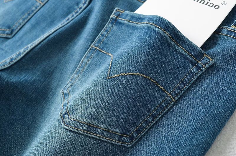 Naiste riided Seksikad madala vöökohaga õhukesed puusad kallistavad toore servaga laienevad püksid Naiste pestud mikro laienenud teksapüksid_voghion.com