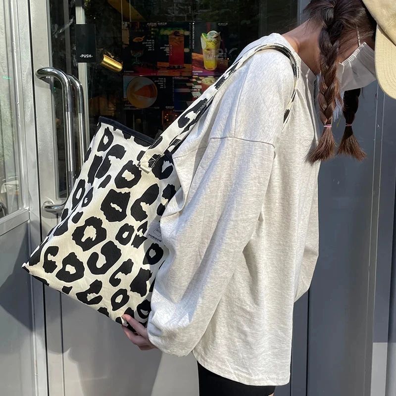 Bolso de lona de diseño moderno para mujer, de alta capacidad, con estampado de vaca y bandolera._voghion.com