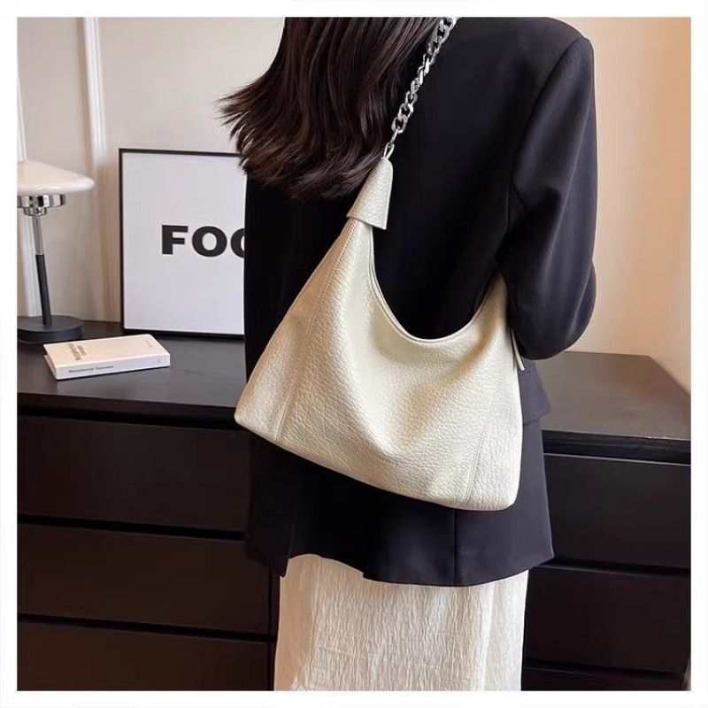 Borsa da donna in pelle di grande capacità 2025 Nuova moda estiva Borsa da pendolare semplice Borsa a tracolla multiuso Versatile Moda squisita_voghion.com