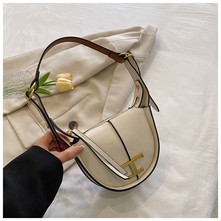 2024 nou geantă semilună din piele naturală geantă de nișă cu jumătate de lună la subrat geantă de șa producătorii de genți de umăr en-gros_voghion.com