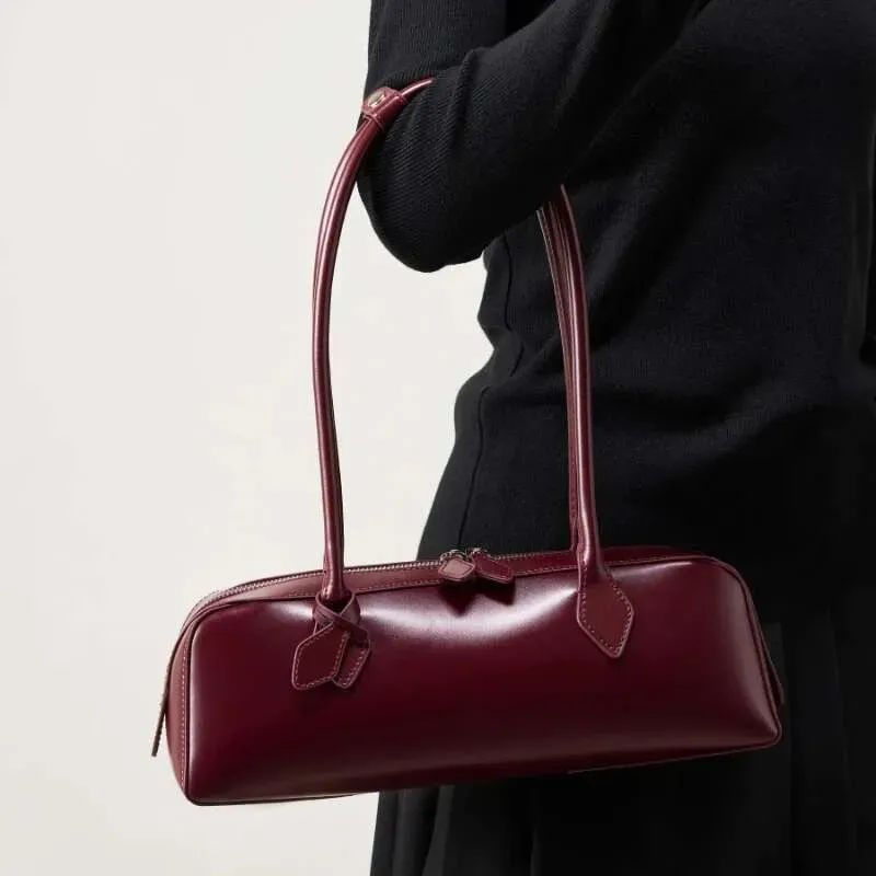 Designer-Tasche 2025 Toptrends Rindsleder Echtes Leder Unterarm-Umhängetaschen für FrauenDesigner Lange Griff Tote Bowg_voghion.com