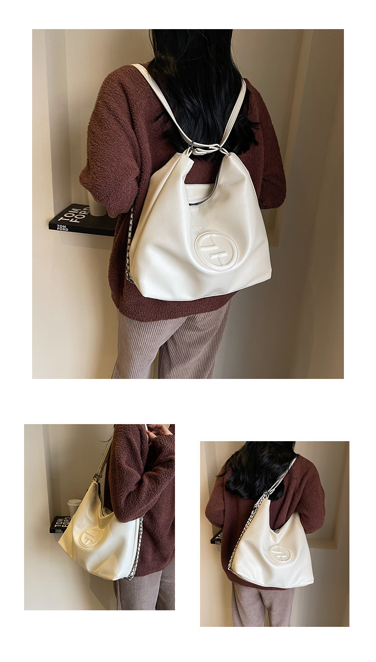 2024 Light Luxury Creative Women's New Cool And Trendy Saddle Bag Fashion Large Capacity Shoulder Bag Solid Color Handbag_voghion.com