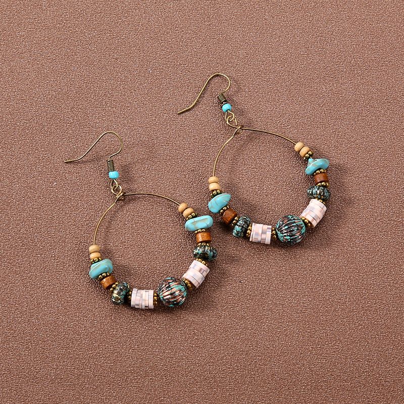 Bohemian Ethnic Style Exaggerated Goddess Face Slimming Tassel Long Earrings Accessories_voghion.com