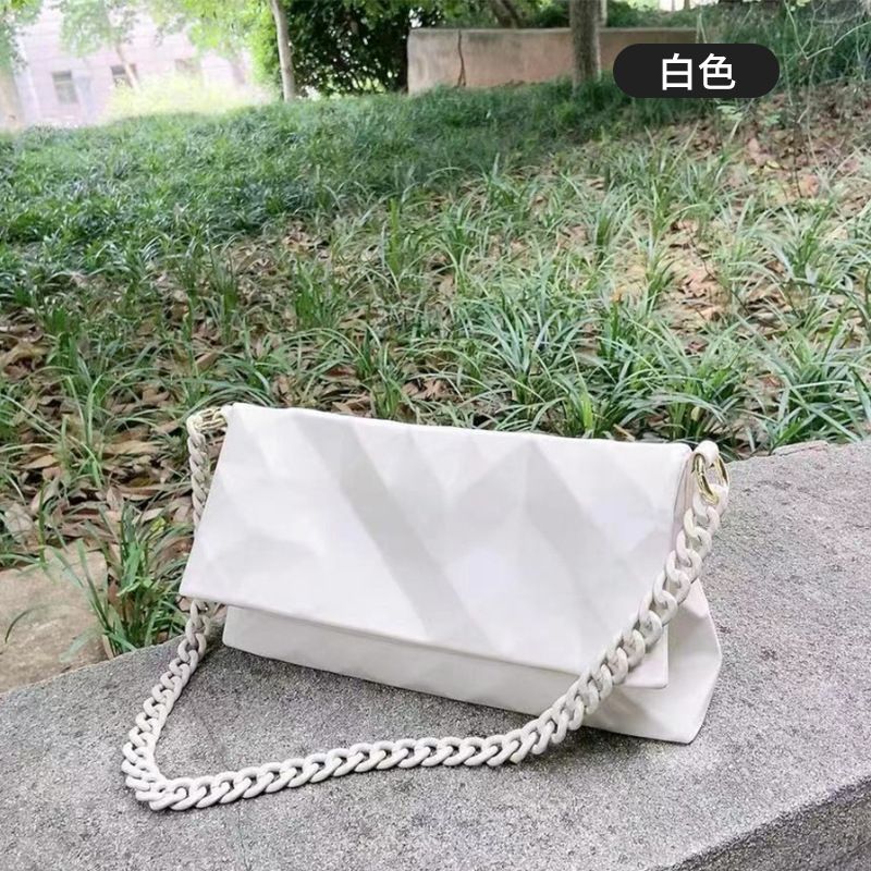 2025 Nova Bolsa Crossbody Feminina Niche Design Fashion Versátil Alça de Corrente Ombro Único Couro Genuíno Axilas de Alta Qualidade_voghion.com