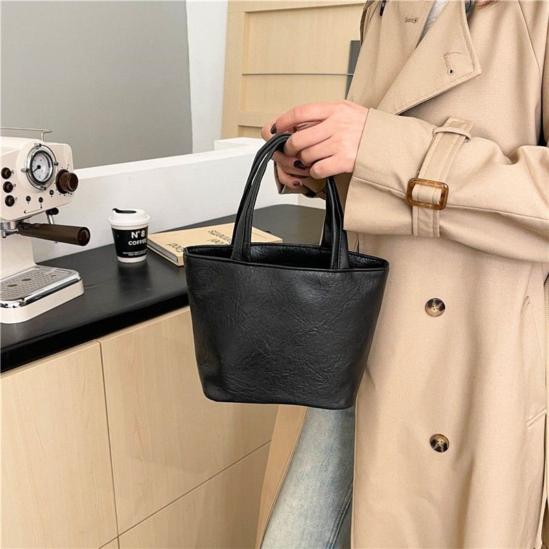 High-End 2025 Neue einfache Damen-Make-up-Tasche mit hohem Aussehen, einfarbig, süße Mini-Handtasche_voghion.com
