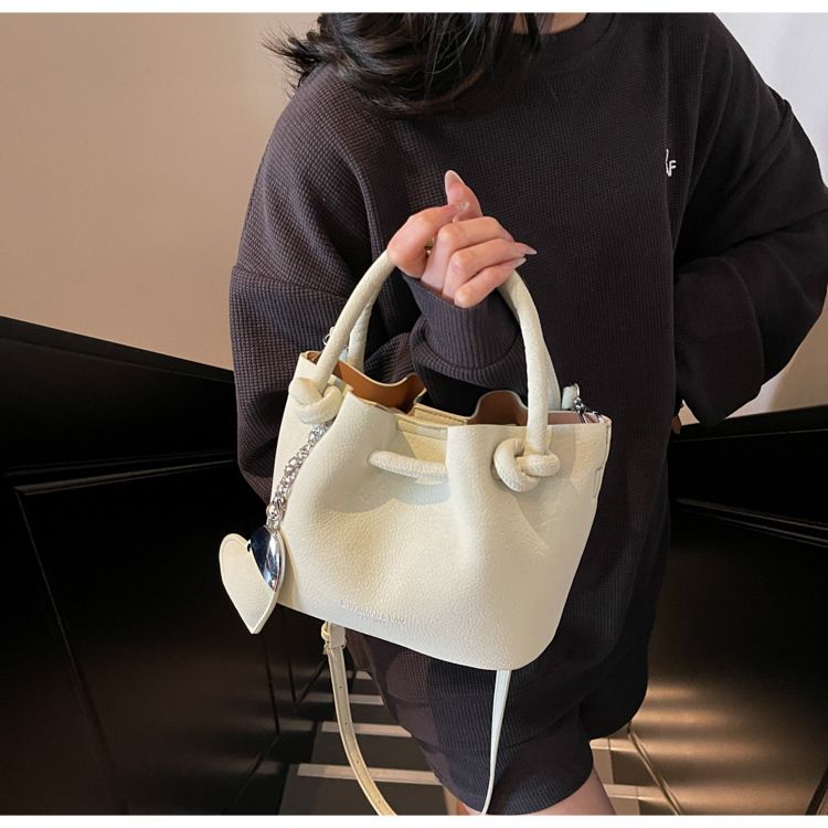 Spring New Personalized Solid Color Folding Drawstring Beaded Bow Shoulder Crossbody Bag_voghion.com