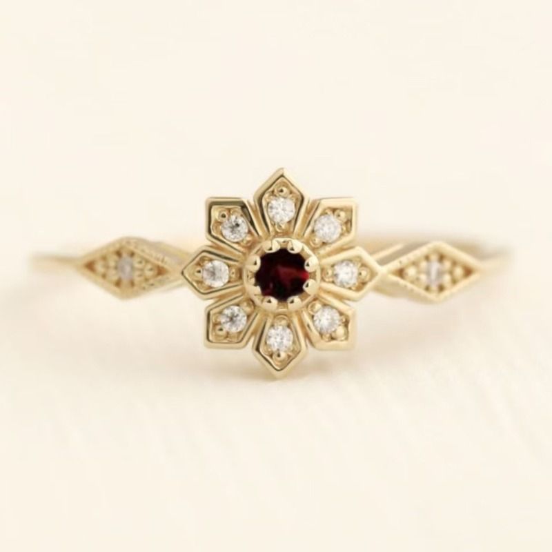 Anello da donna semplice e versatile, in stile europeo e americano, con pietra preziosa rossa a forma di fiocco di neve, intarsiato con personalità._voghion.com