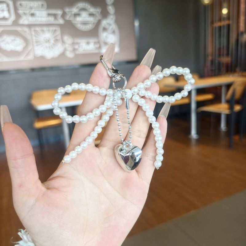2025 New Pearl Bow Silver Heart Pendant Keychain_voghion.com