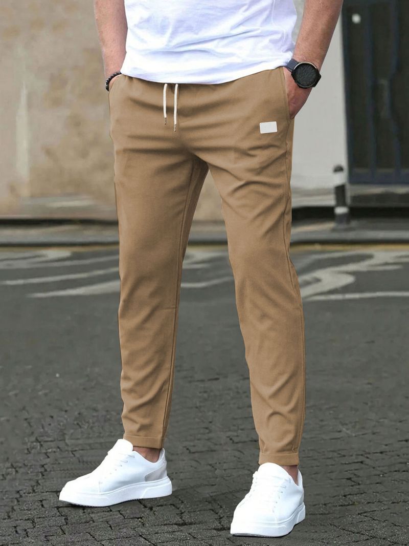 Pantaloni casual slim fit da uomo - Tinta unita, design a nove punti, dettaglio etichetta in pelle, comodi pantaloni con tasche_voghion.com