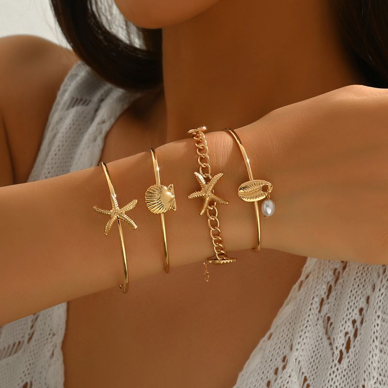 Ocean Style Armbandset Groothandel Europese en Amerikaanse Sieraden Schelp Zeester Temperament Veelzijdig Ontwerp Open Armband_voghion.com