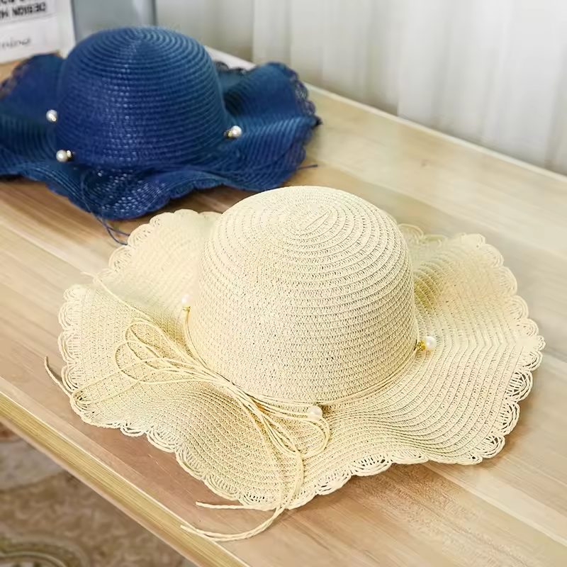 2 modieuze zomerse, frisse, golvende, grote strohoeden met brede rand, veelzijdige, casual strandparasols_voghion.com