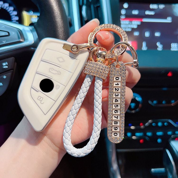 Portachiavi per auto creativo e alla moda, in pelle di alta qualità, con corda intrecciata a mano, con punta forata, dispositivo anti-smarrimento per targa_voghion.com