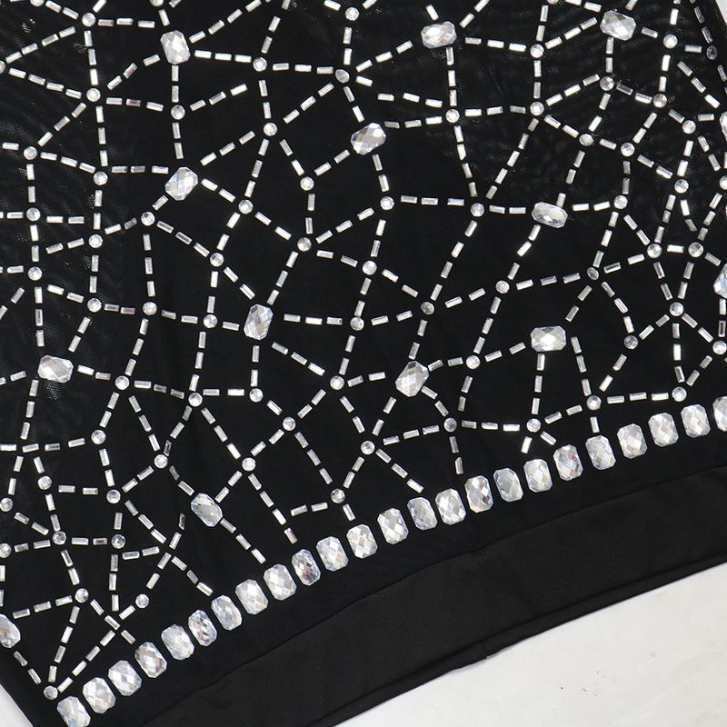 Completo due pezzi in rete con paillettes - Top corto con scollo tondo e minigonna aderente con lingerie_voghion.com
