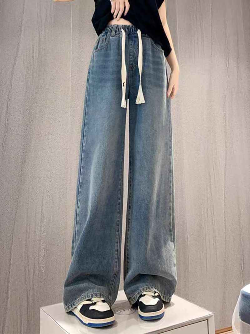 Conjunto de top holgado y jeans con cintura elástica para mujer: un conjunto moderno de dos piezas para un estilo informal y cómodo._voghion.com