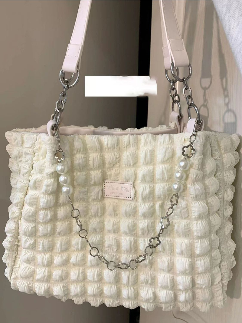 2023 Nuova borsa tote di grande capacità con catena a sbuffo color crema di nicchia, borsa a tracolla portatile morbida e versatile da donna_voghion.com