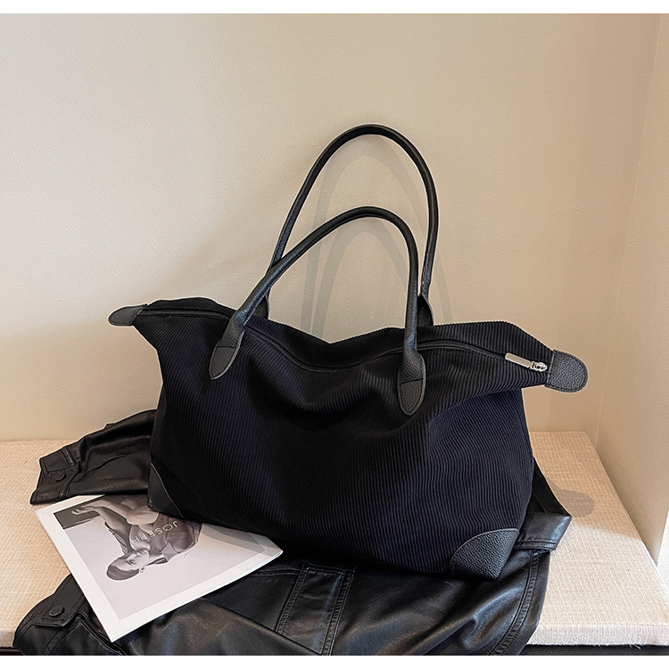 Borsa da viaggio a spalla singola per pendolarismo di grande capacità, design di nicchia, casual e versatile, semplice e alla moda, in velluto a coste, per donna_voghion.com