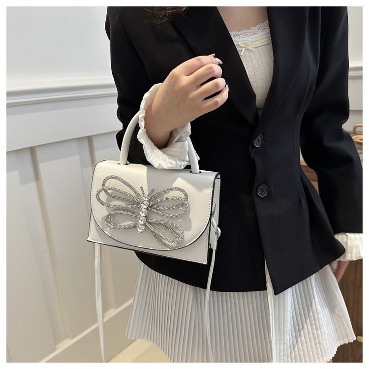 Trendi minimalistički leptir ženski top za proljeće 2024., novi, moderni proljetni mali kvadratni, ležerni i personalizirani top s jednim ramenom_voghion.com