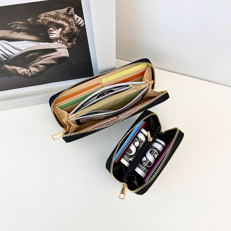 Torby damskie Nowa krótka damska portmonetka w stylu nadrukowanej torby do przechowywania Duża pojemność z wieloma przegródkami na karty Mini torba na karty_voghion.com