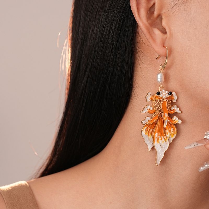Dripping pearlescent goldfish ear hook earrings New Year's festive temperament retro earrings_voghion.com