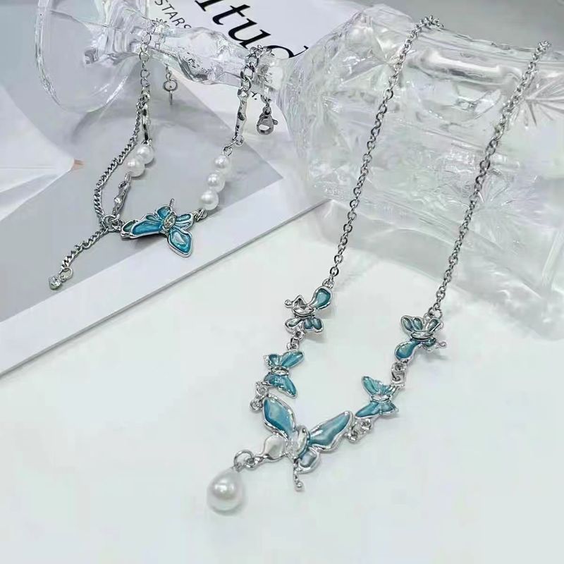 Sött och coolt, coolt, känsla, blått fjärils-pärlhalsband, kvinnlig nischdesign, sensa, nyckelbenskedja, högt temperamentshalsband, kedja, tidvatten_voghion.com