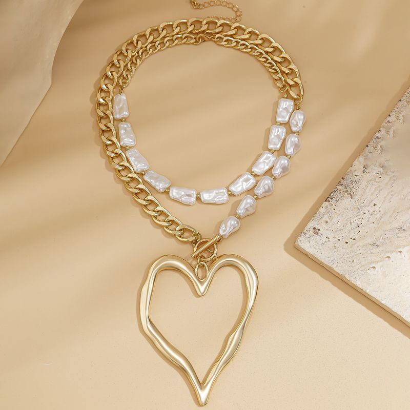 Elegante collana a doppio strato con cuore di lava esagerato in perle artificiali barocche_voghion.com