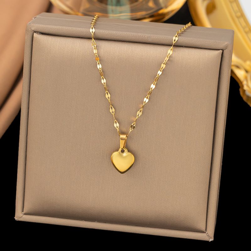 Stainless steel metal necklace set, fashionable, luxurious, high-end peach heart earrings_voghion.com