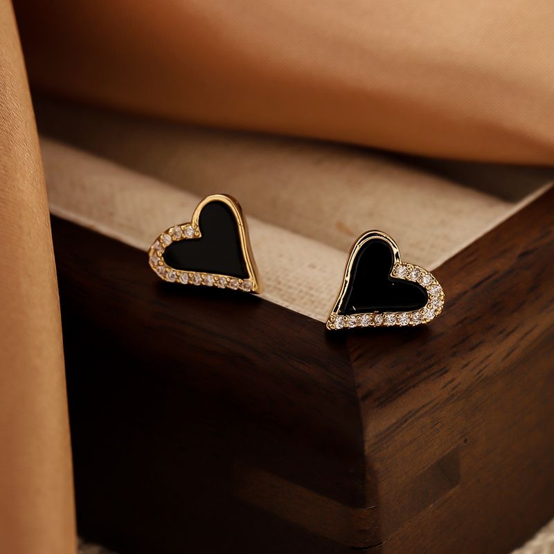 1 par de elegantes pendientes con forma de corazón, con barniz para horno, incrustaciones huecas, de resina de cobre y circonita, chapados en oro de 14 quilates_voghion.com