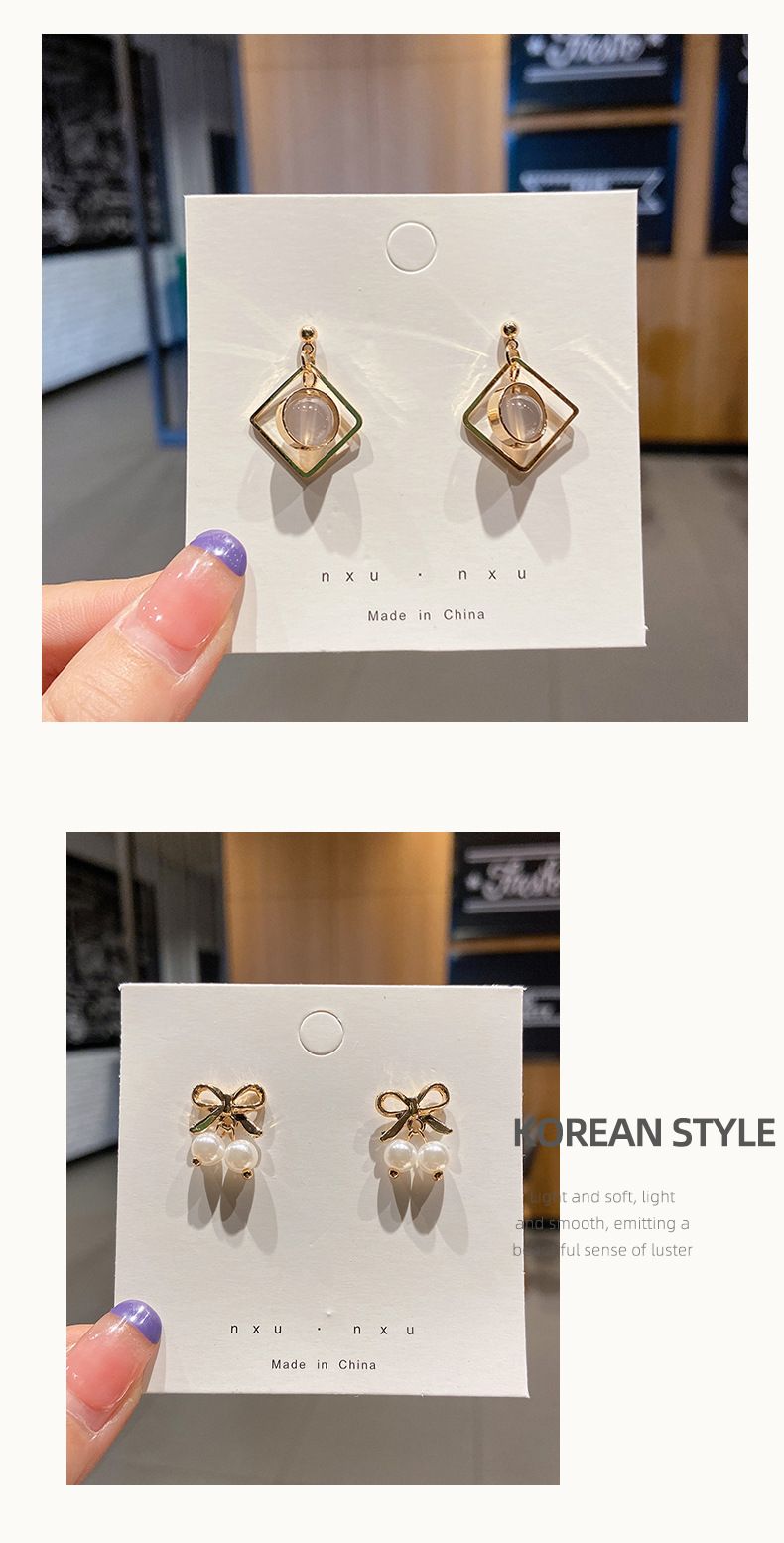 Orecchini coreani semplici ad ago in argento del mercato notturno, design di minoranza femminile, orecchini con nappe alla moda ed eleganti_voghion.com