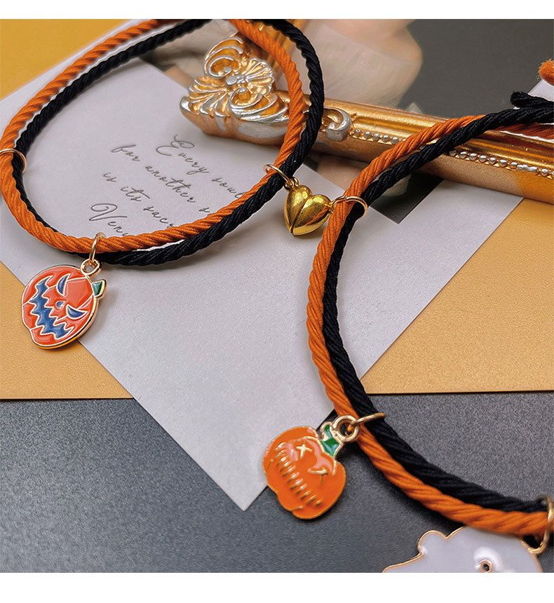Het försäljning nya Halloween armband tecknad pumpa spöke hand med kärlek hjärta magnetisk par set hand rep_voghion.com