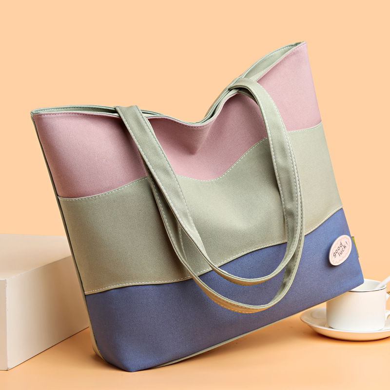 Large-capacity canvas bag female 2022 new contrast color shoulder bag simple commuter handbag striped tote bag_voghion.com