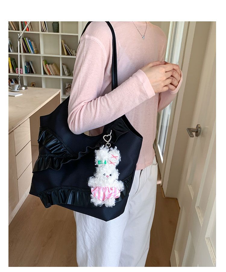 Borse alla moda di quest'anno 2025 Nuova versione coreana Moda Foglia di loto Versatile Spalla Donna Grande capacità Portatile_voghion.com