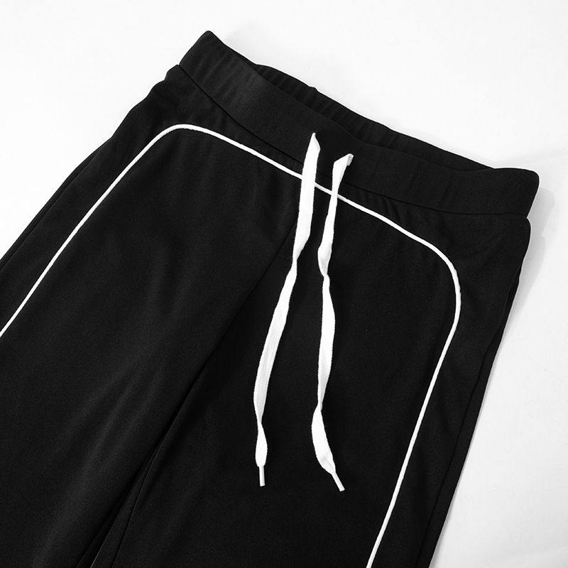 Abbigliamento da donna, linea autunno e inverno, pantaloni a vita alta con elastico in corda, senza colletto, con cerniera, in colori a contrasto_voghion.com