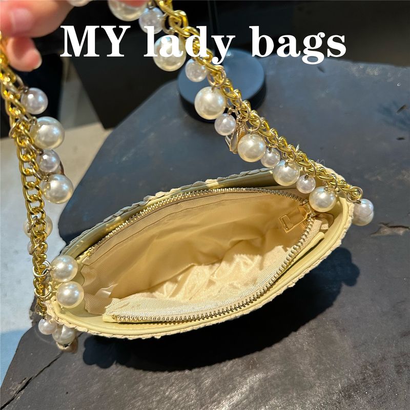 Niche Design New Natural Conch Pearl Chain Beach Vacation High-end French Style Round Straw Bag For Women_voghion.com