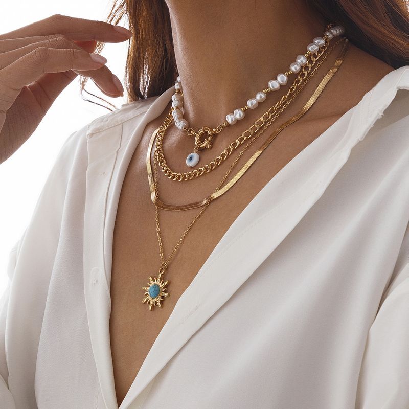 Gioielli transfrontalieri europei e americani, collana di perle di forma speciale in stile etnico, catena a clavicola in lega retrò con ciondolo a forma di occhio di sole_voghion.com