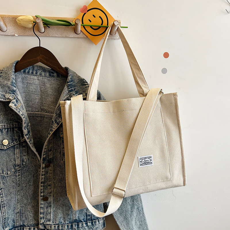 Borsa a tracolla con tracolla a forma di piccola piazza in velluto a coste da donna 2023, nuova tendenza della Corea del Sud_voghion.com