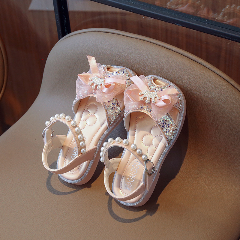 Mädchen Mode Prinzessin 2024 Sommer Neue Mädchen Baby Bogen Headed Kinder Hohl Sandalen_voghion.com