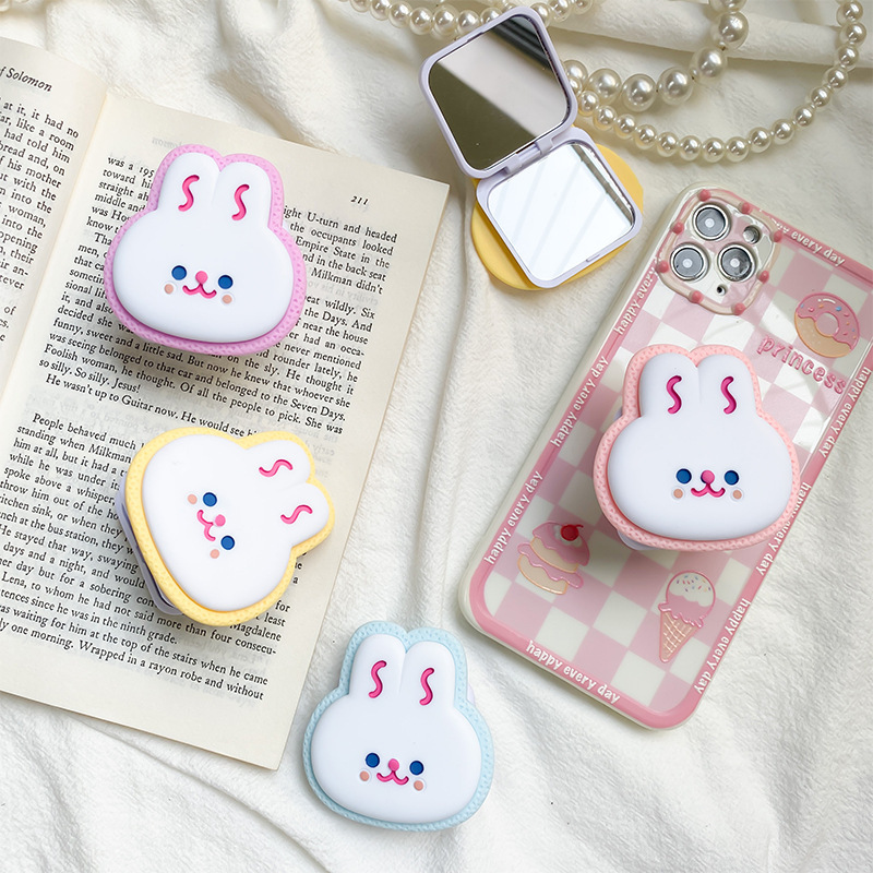 Supporto per airbag per cellulare a forma di coniglio con simpatico cartone animato, incollato con specchio da trucco portatile da tavolo, supporto stabile per nicchia_voghion.com