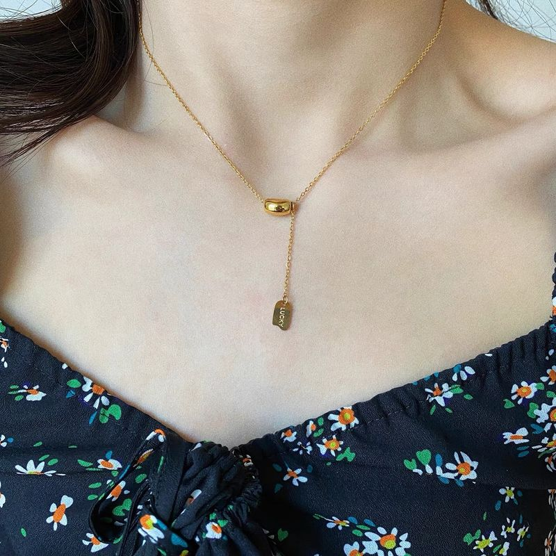 Modieuze kwast kleine gouden bonen titanium stalen ketting, eenvoudig luxe temperament, trendy en niche ontwerp meisje_voghion.com