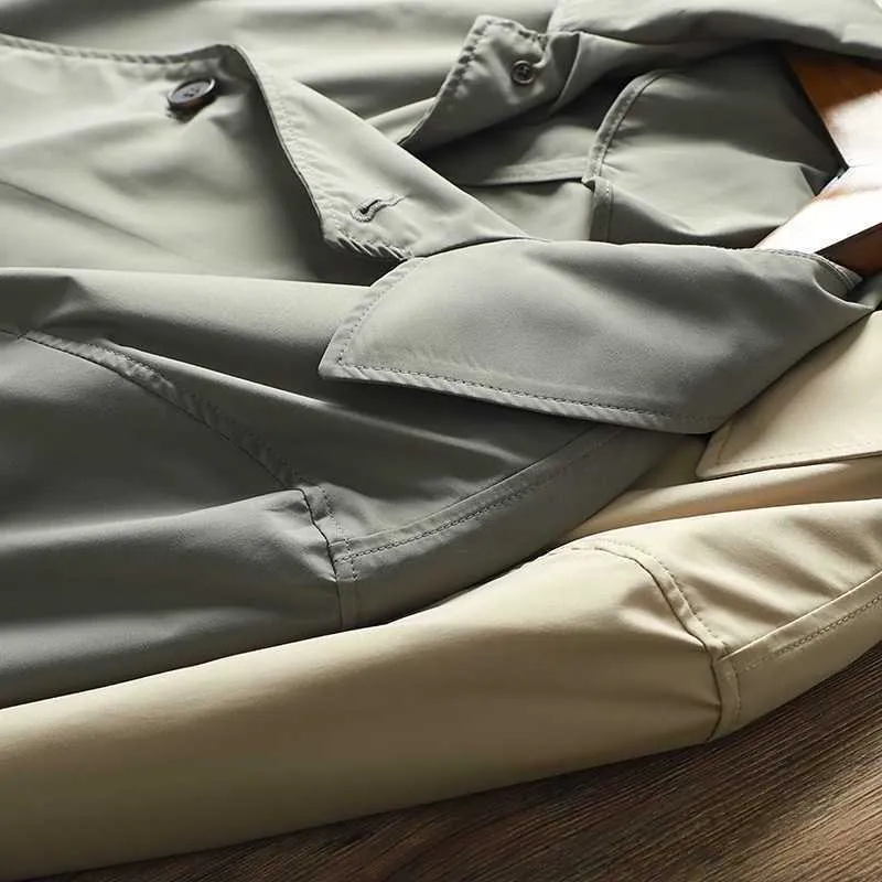 Cappotti Abbigliamento uomo Primavera 2022 Nuovo trench da uomo di media lunghezza monopetto in tessuto tecnico impermeabile e resistente agli strappi_voghion.com