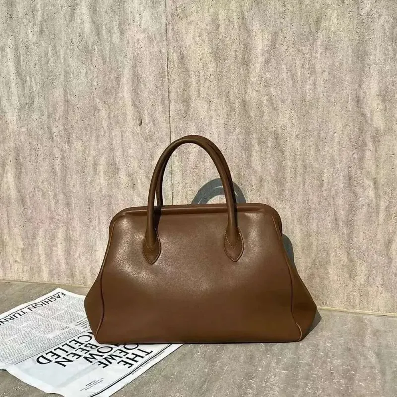 Designer 2025 New Vegetable Tanned Cowhide Shell Niche Retro Leather Clip Catfish Versatile Single Shoulder Messenger_voghion.com
