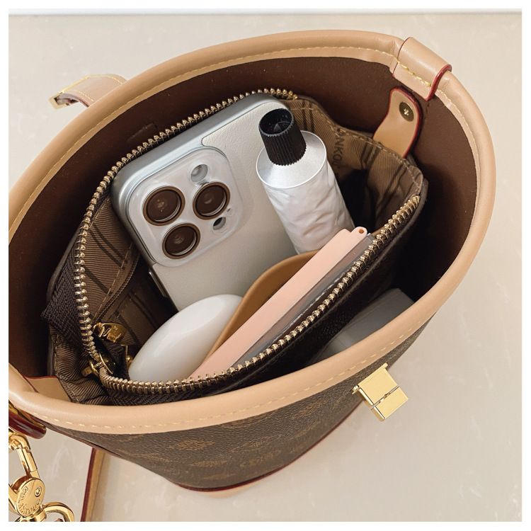 Tendenza di quest'anno: borsa a secchiello leggera e lussuosa stampata per le donne, nuova borsa alla moda 2025, borsa a tracolla versatile_voghion.com