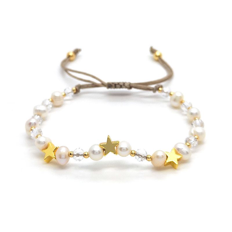 Bracciale in stile bohémien con catena cubana multistrato placcata in oro e perle naturali impilate_voghion.com